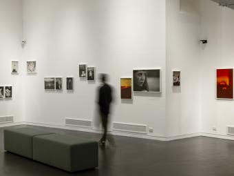 An interior photograph of Manningham Art Gallery showing photographs by Katrin Koenning on the walls.